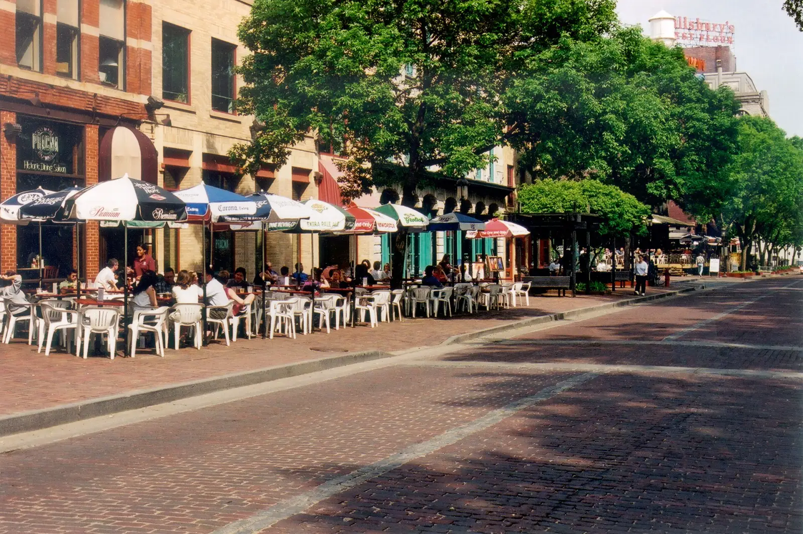 Umbrellas and tables at an outdoor cafe in Minneapolis. The photo was not taken in Horizon West.