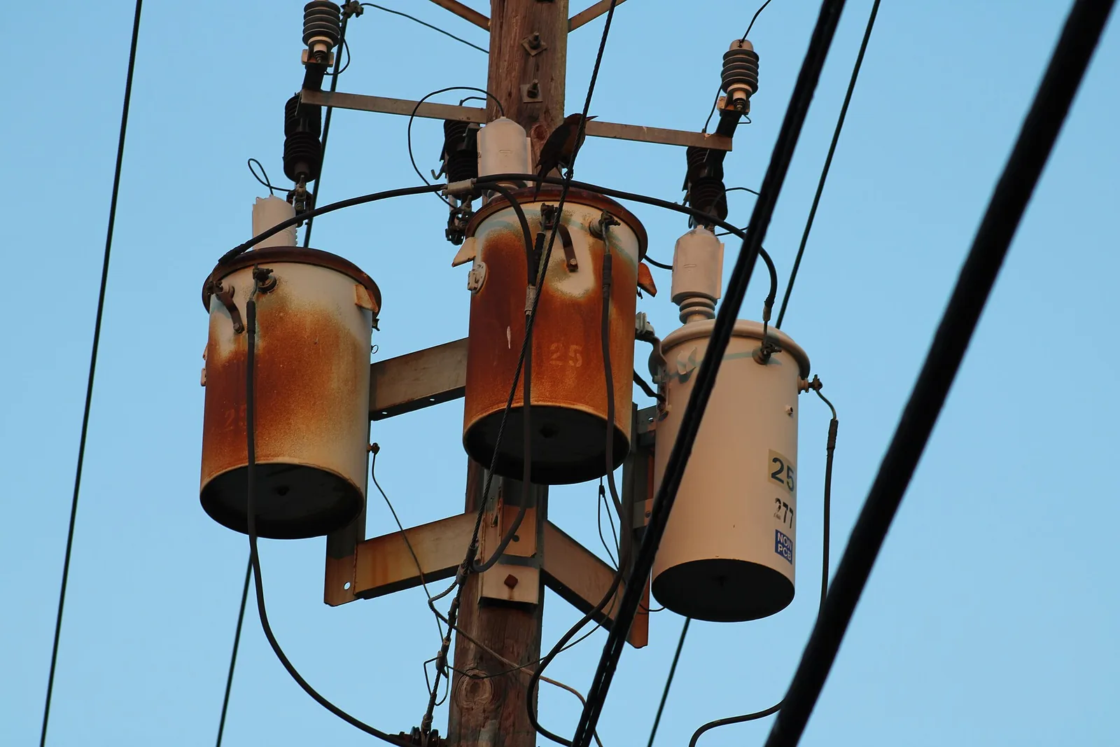 Duke Energy transformers on a utility pole along a street in Largo, Florida