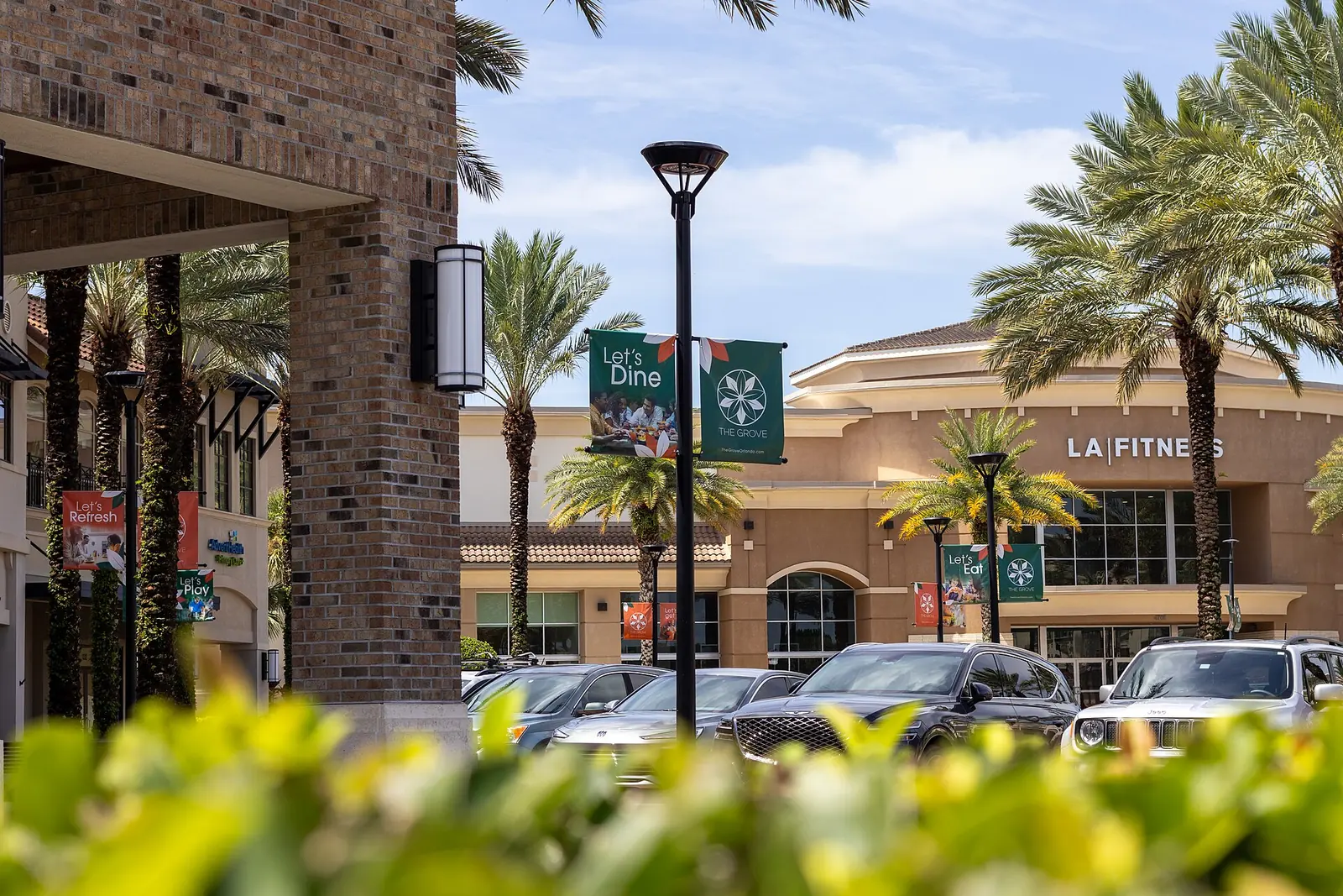 Restaurant banners at The Grove, a shopping plaza on South Apopka Vineland Road east of Horizon West