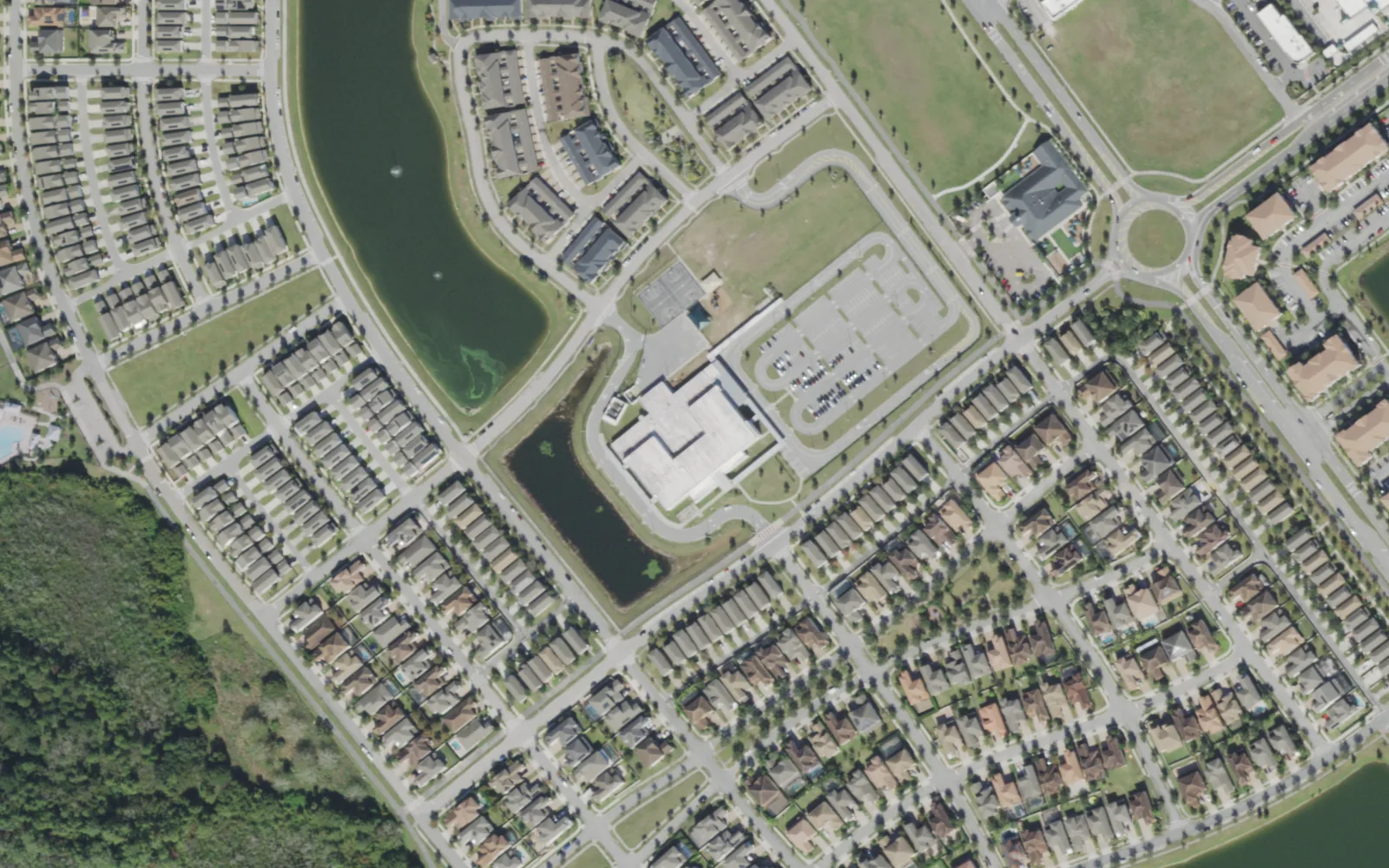 Bay Lake Elementary School on Silverlake Park Drive in Lakeside Village, seen from the air, with homes on every side