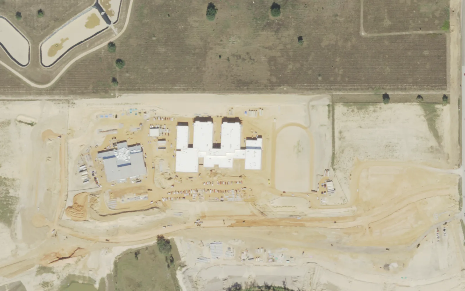 The shared Hamlin Middle and Hamlin Elementary campus on Silver Grove Boulevard under construction in December 2021, seen from the air