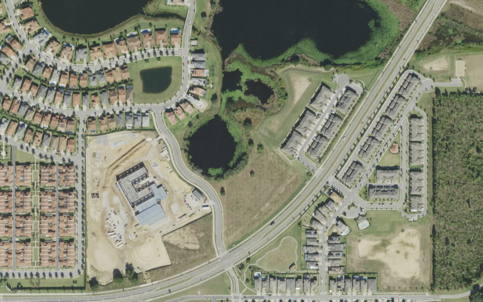 Panther Lake Elementary under construction off Summerlake Groves Street, left of center, seen from the air in December 2021