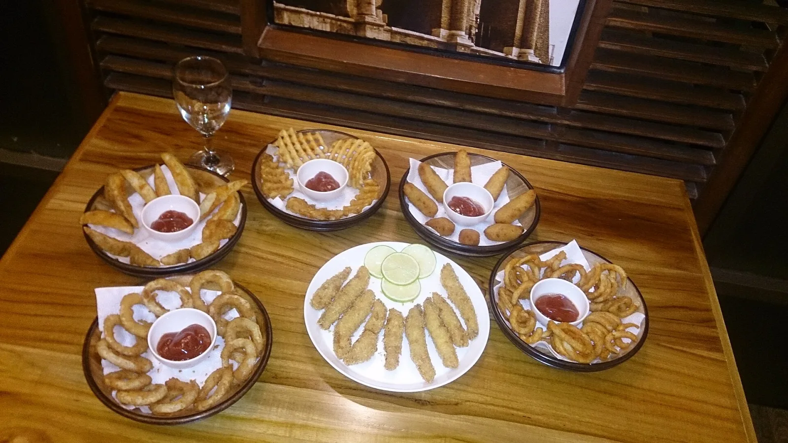 Pasta and other Italian dishes served on a restaurant table. The photo was not taken in Horizon West.
